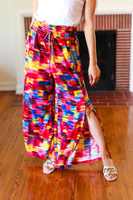 Load image into Gallery viewer, Vacay Vibes Smocked Waist Side Slit Palazzo Pants in Kaleidoscope
