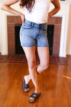 Load image into Gallery viewer, Medium Blue Mid-Rise Button Flap Back Pocket Denim Shorts by Judy Blue
