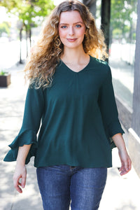 Falling In Love Hi-Lo Ruffle Sleeve Woven Top in Hunter Green