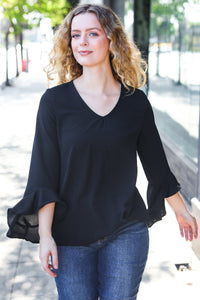 Falling In Love Hi-Lo Ruffle Sleeve Woven Top in Black