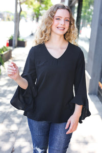 Falling In Love Hi-Lo Ruffle Sleeve Woven Top in Black