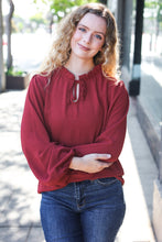 Load image into Gallery viewer, Feeling Femme Burgundy Frilled Edge V Neck Tie Top
