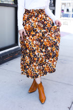 Load image into Gallery viewer, Casual Living Floral Tiered Smocked Waist Midi Skirt in Black
