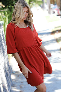 Meanwhile in Milan Three Quarter Puff Sleeve Babydoll Dress in Rust