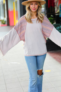 Set Into Motion Chevron Raglan Lace-Up Bell Sleeve Top