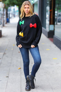 Making Spirits Bright Black Multicolor Sequin Bow Knit Sweater