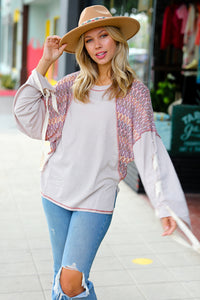 Set Into Motion Chevron Raglan Lace-Up Bell Sleeve Top