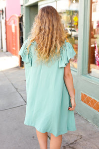 Out For The Day Crinkle Woven Ruffle Sleeve Dress in Sage