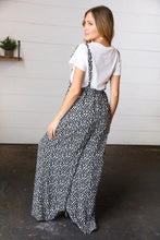 Load image into Gallery viewer, She&#39;s Young &amp; Wild Animal Print Wide Leg  Frilled Jumpsuit in Black &amp; White
