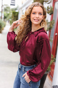 Holiday Vibes Frill Detail Tie Neck Satin Top in Burgundy