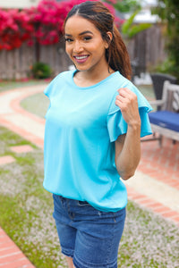 Lovely In Tiered Double Ruffle Sleeve Woven Top in Blue