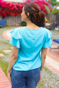 Lovely In Tiered Double Ruffle Sleeve Woven Top in Blue