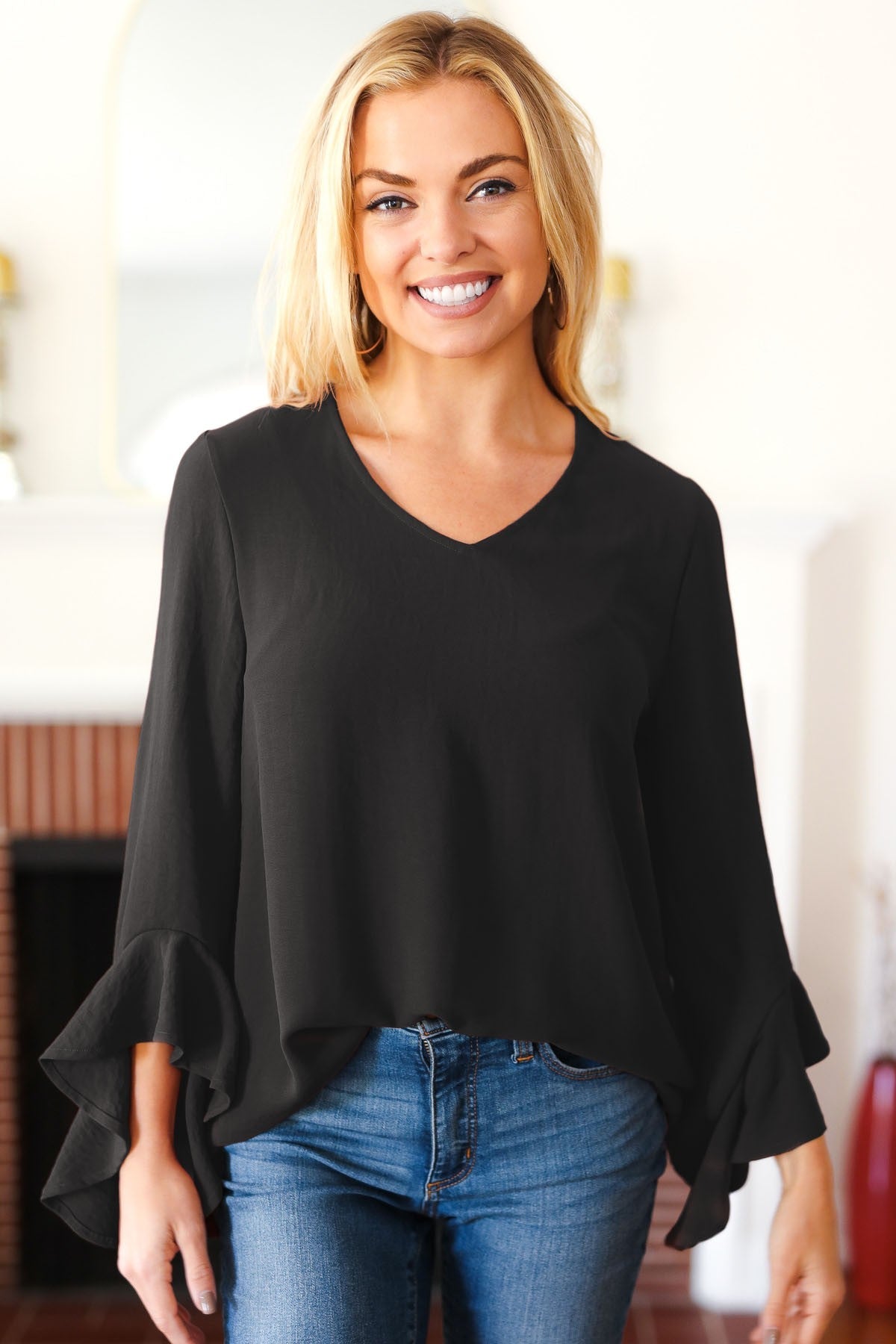 Falling In Love Hi-Lo Ruffle Sleeve Woven Top in Black