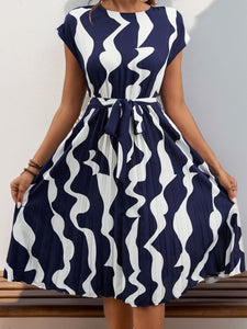 Perfee Tied Pleated Printed Cap Sleeve Dress (multiple color options)