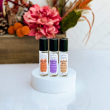 Load image into Gallery viewer, Indulge in the aromatic pleasures of fall with the Autumn Vibes Roll-On Perfume. Convenient and captivating, it’s your little secret to staying fragrant with the scents of the season.
