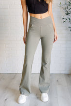 Load image into Gallery viewer, Building Habits Twill Flared Crossover Waist Pant in Dusty Olive
