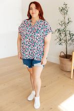 Load image into Gallery viewer, Lizzy Cap Sleeve Top in Navy and Hot Pink Floral
