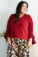 Load image into Gallery viewer, Falling In Love Hi-Lo Ruffle Sleeve Woven Top in Rust
