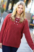 Load image into Gallery viewer, Fall Vibes Rust Cable Knit Lace Up V Neck Sweater
