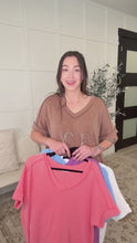 Load and play video in Gallery viewer, Growing Restless V-Neck Tee in Spring Blue
