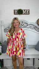 Load and play video in Gallery viewer, Eyes On You Coral &amp; Yellow Geo Abstract Surplice Woven Romper
