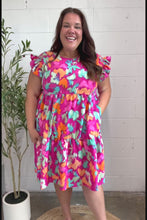 Load and play video in Gallery viewer, Look of Love Fuchsia Abstract Floral Print Smocked Ruffle Sleeve Dress

