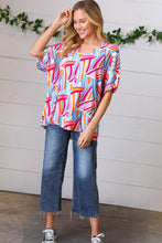 Load image into Gallery viewer, Dreamers &amp; Believers Geo-Print V-Neck Top
