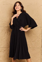 Load image into Gallery viewer, Make Your Move Solid Surplice Midi Dress
