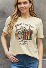 Load image into Gallery viewer, READING IS DREAMING WITH YOUR EYES OPEN Graphic Cotton Tee (2 color options)
