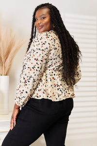 A Total Charmer Printed Tied Plunge Peplum Blouse