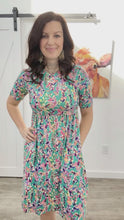 Load and play video in Gallery viewer, Timing is Everything Floral Midi Dress
