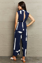 Load image into Gallery viewer, Mighty Maven Round Neck Cutout Jumpsuit with Pockets
