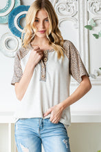 Load image into Gallery viewer, Animal Print Half Button Short Sleeve Top
